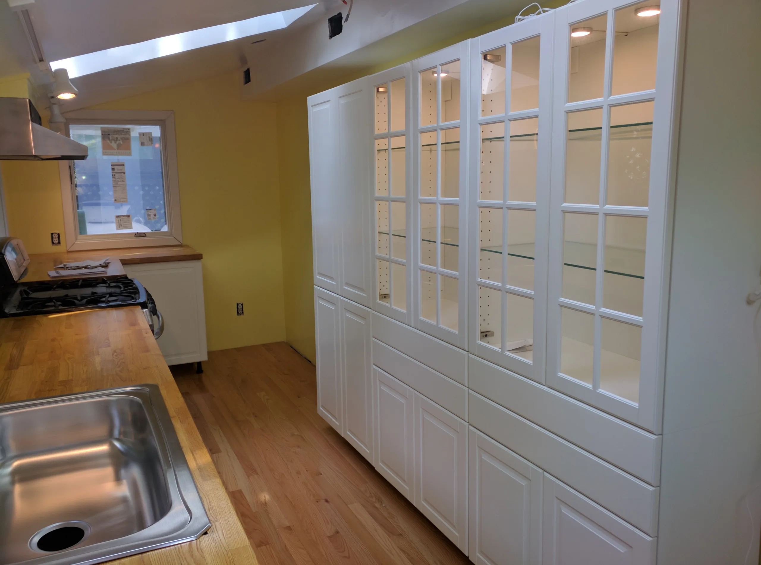 Lighted IKEA kitchen pantry Cabin John MD. Installer: District Handyman